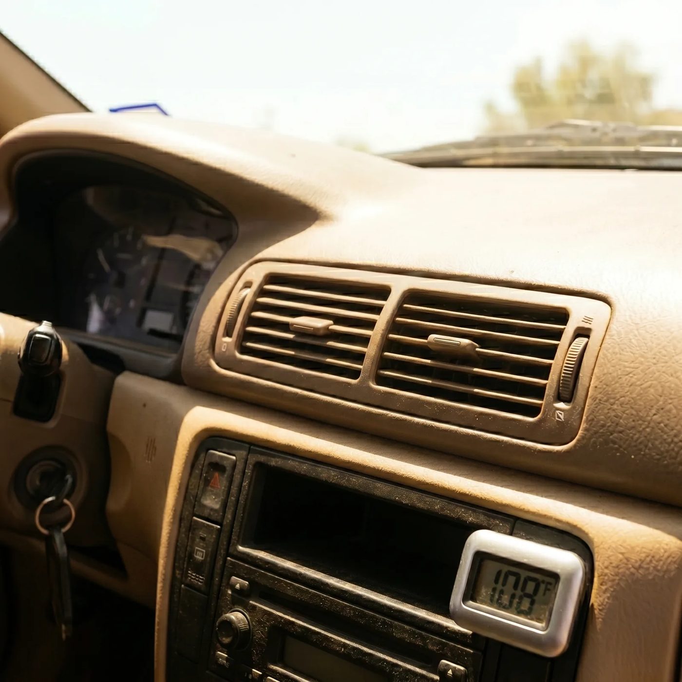 Dashboard air vents and climate control panel inside a vehicle