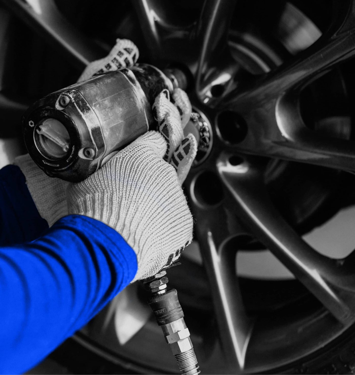 Brake caliper and rotor on a road wheel during brake service