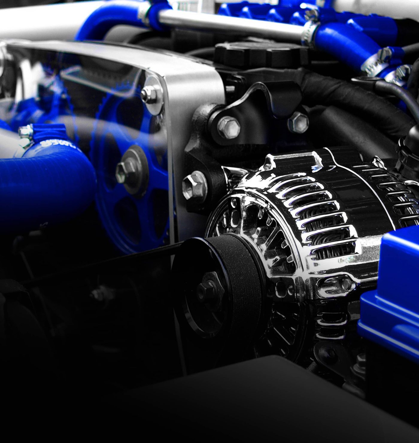 Alternator and drive belt in a European engine bay